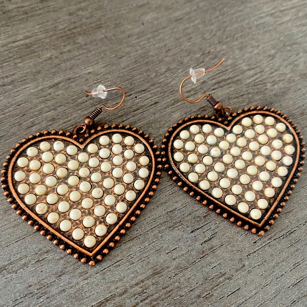 New, never worn adorable heart earrings with ivory colored beads in center!